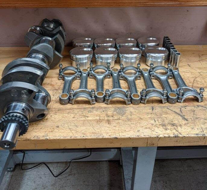 rotating assembly parts on a workbench