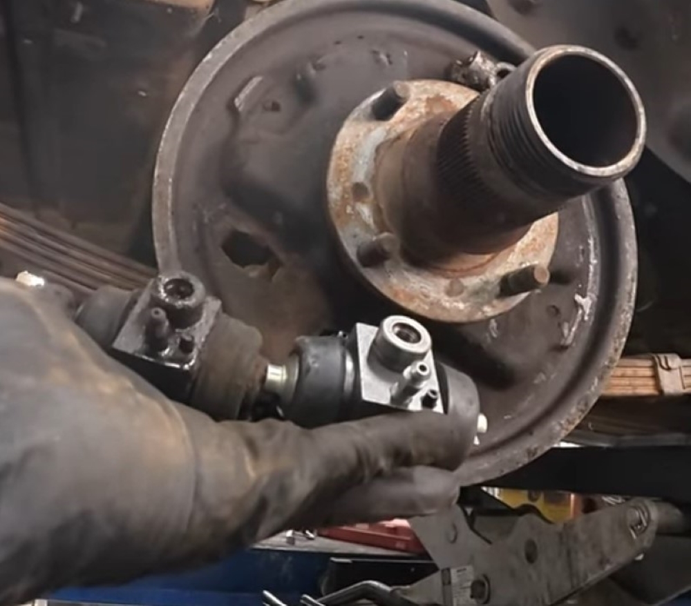 Comparing factory and replacement wheel cylinders for an MGB GT