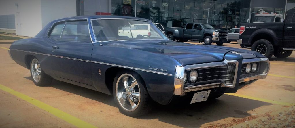 Blue 1969 Pontiac Laurentian, passenger side