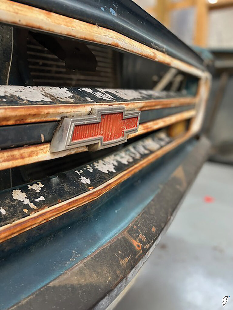 Old, rusty C-10 grille and bowtie emblem